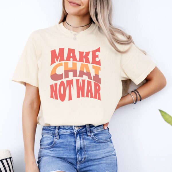 Make Chai Not War | Tea Lover Gift Cozy Unisex T-Shirt